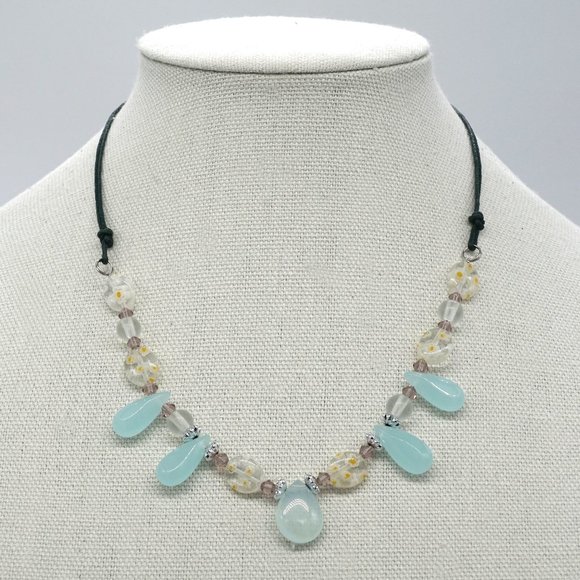 MyBeadEmporium Jewelry - Custom made necklace with assorted beads and leather strand.